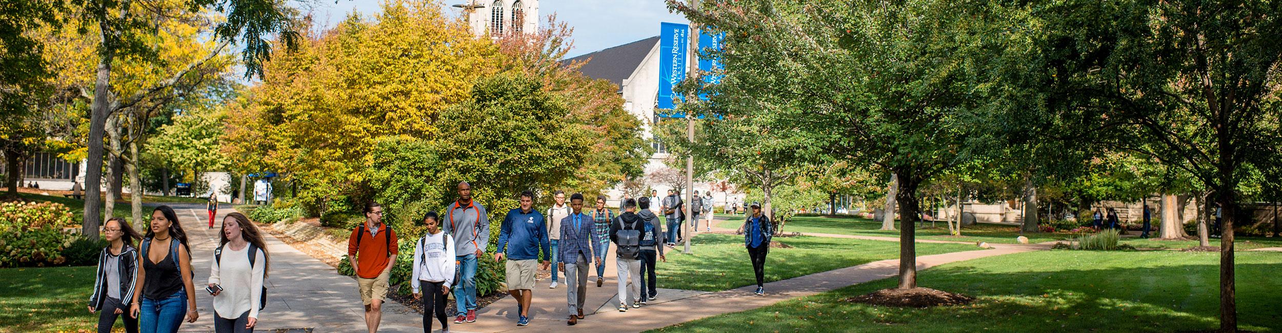 Photo of CWRU students walking across campus