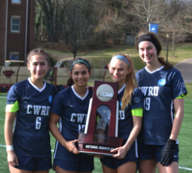 Womens-soccer-players-hold-2022-national-championship-runner-up-trophy