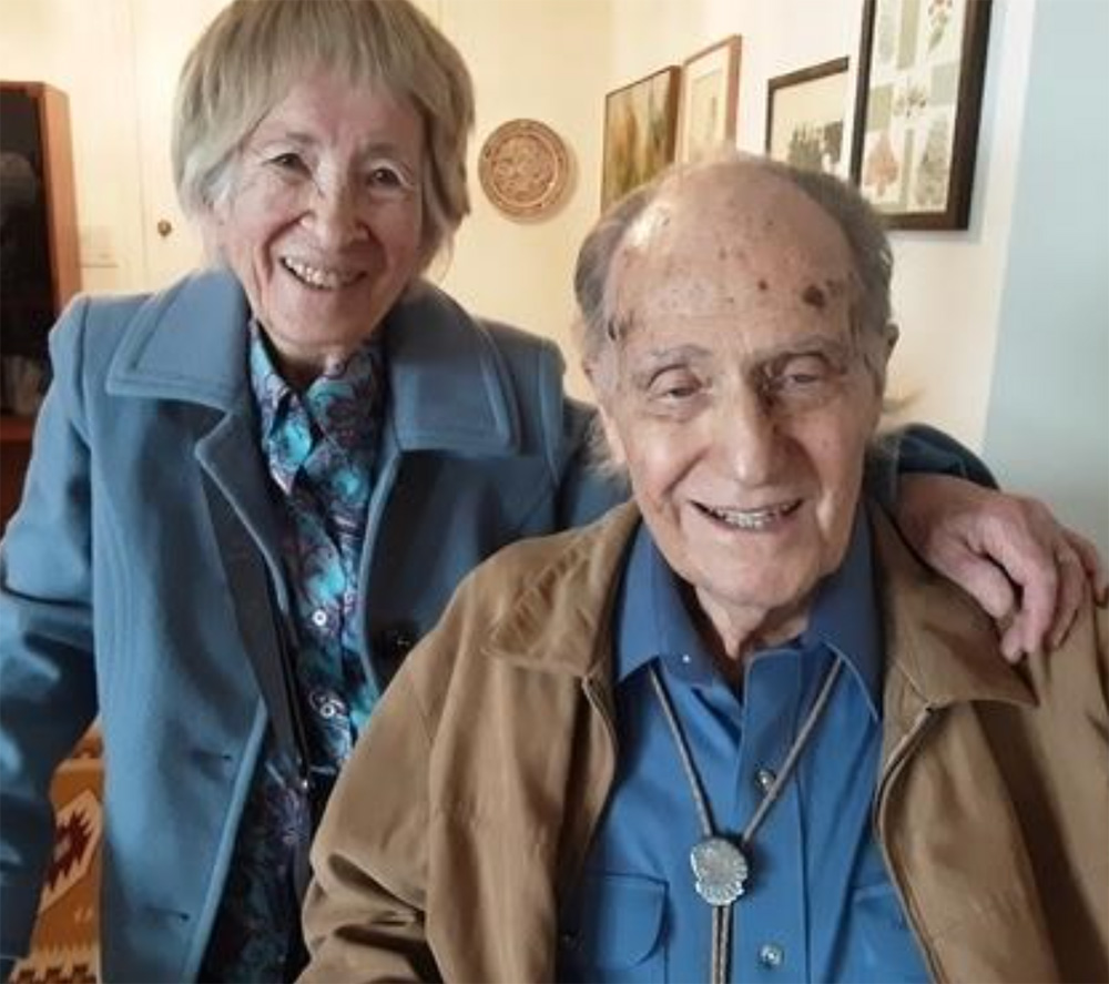 A picture of an elderly couple smiling together